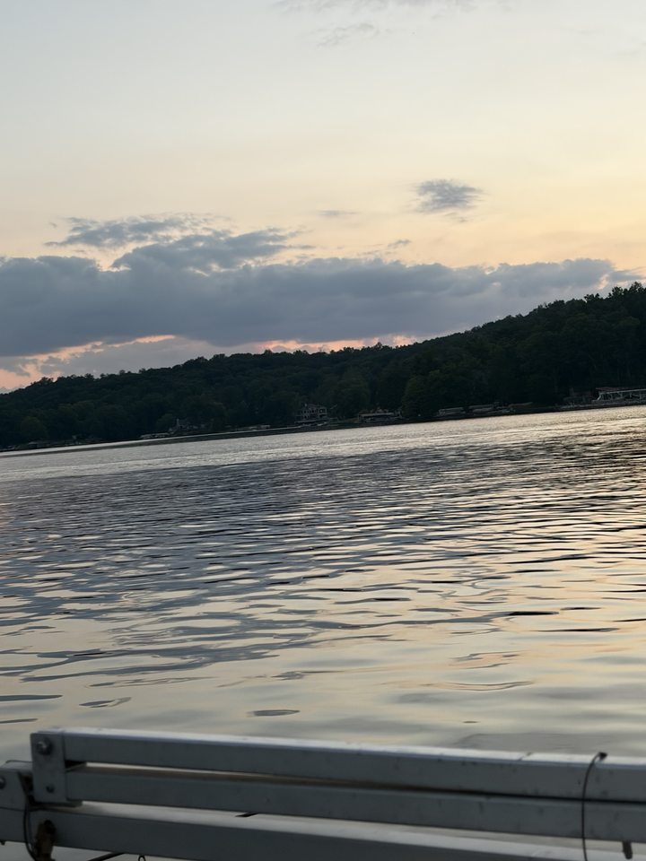 Soft evening light over gently rippling lake water